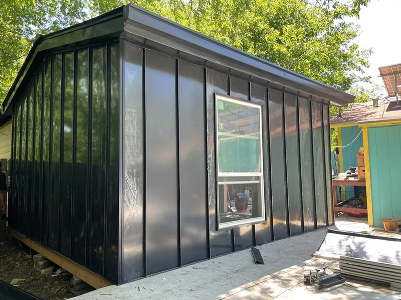 Black standing seam metal wall panels for Roof Inspection in Opelika